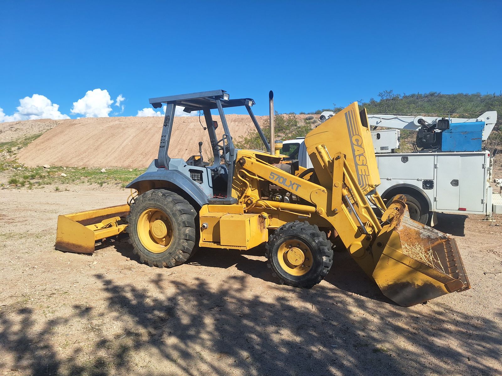 Case 570LXT loader and service truck